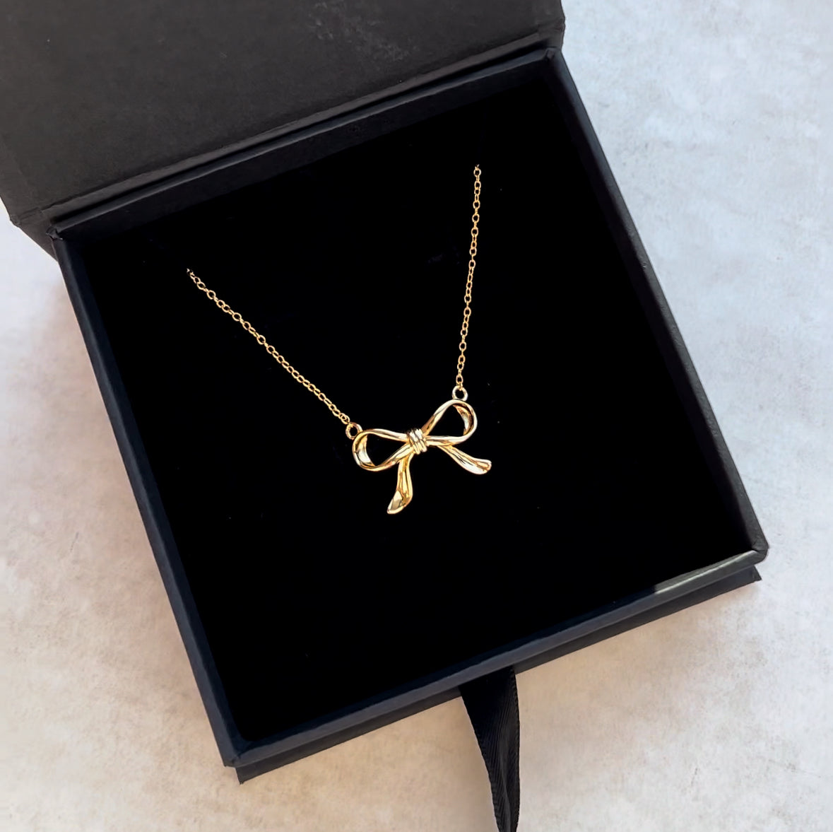 Gold Fine Chain Bow Necklace